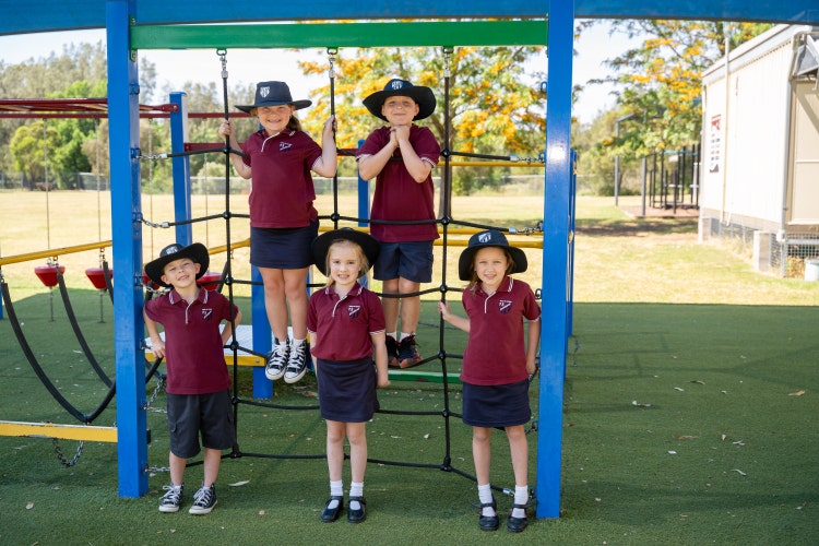Students on play equipment