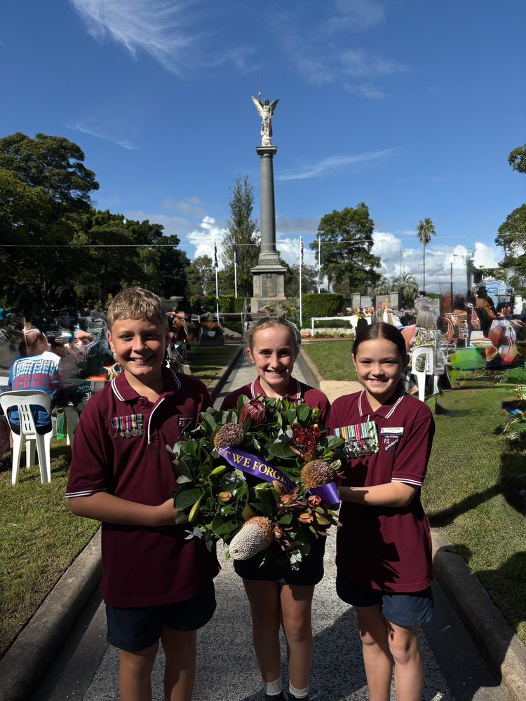 Students holding Anzac wreath