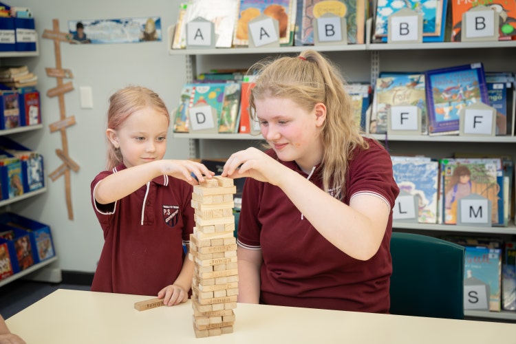 picture of 2 students playing jenga