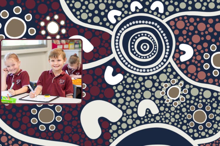 2 students smiling in class with school cultural background