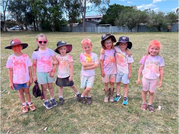 Students smiling after colour run